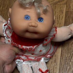 Mattel Baby Doll with Blue Eyes and Red-Accented Outfit